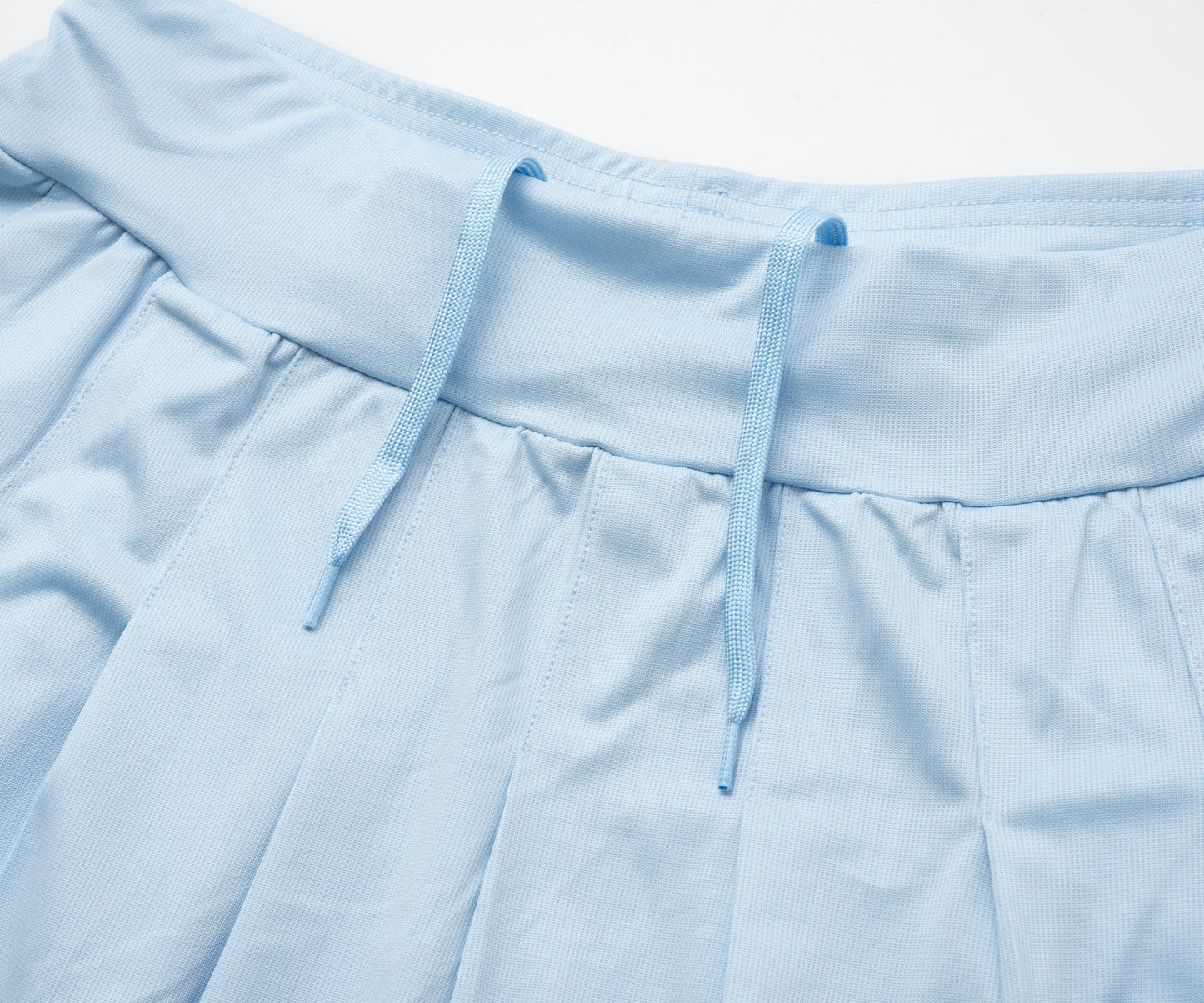 アシメヘムプリーツスコート